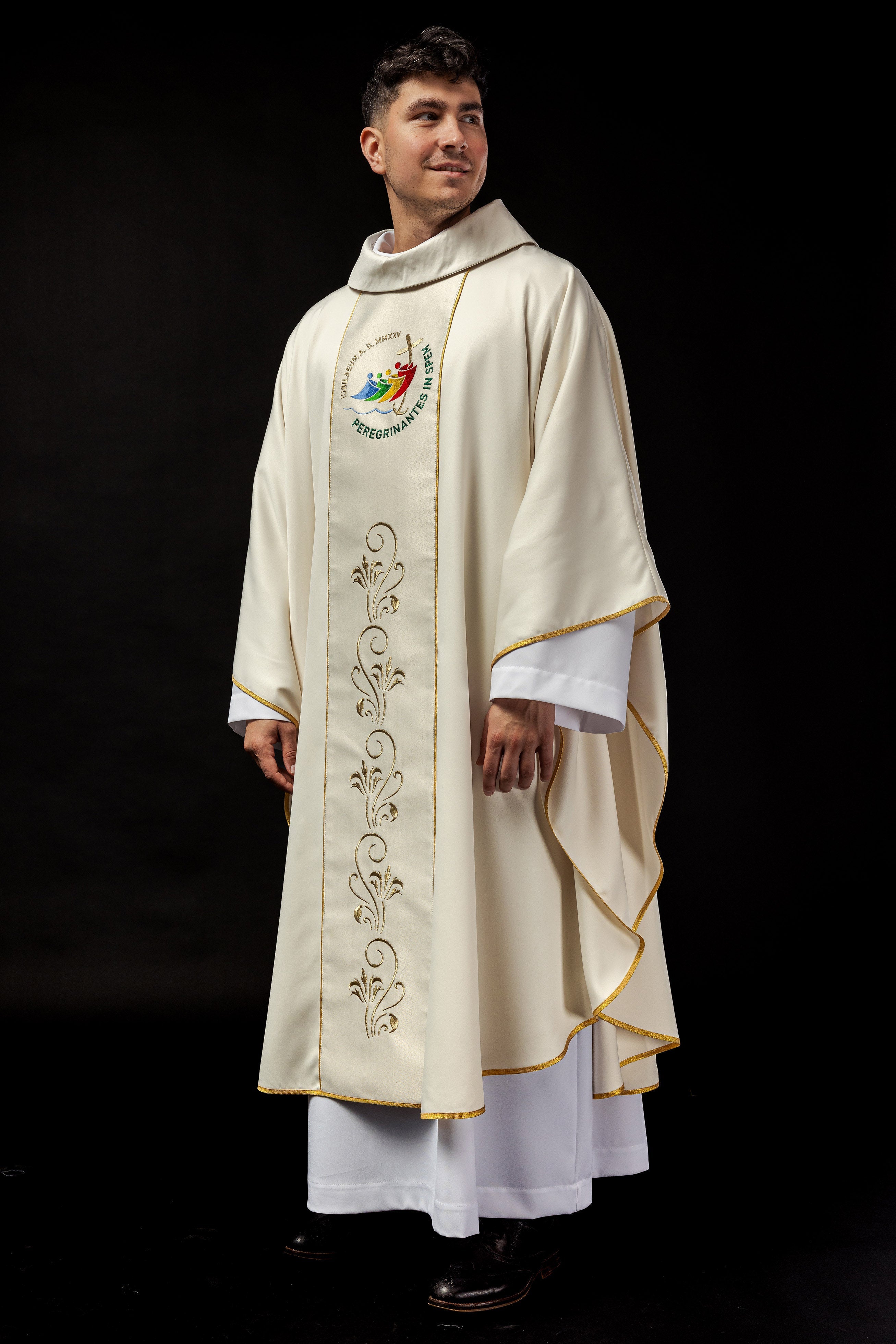 Jubilee chasuble in ecru featuring the embroidered Rome 2025 logo